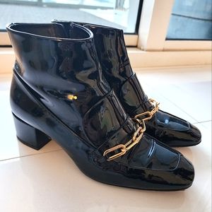Burberry patent leather booties with gold hardware
